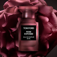 perfume with rose cap