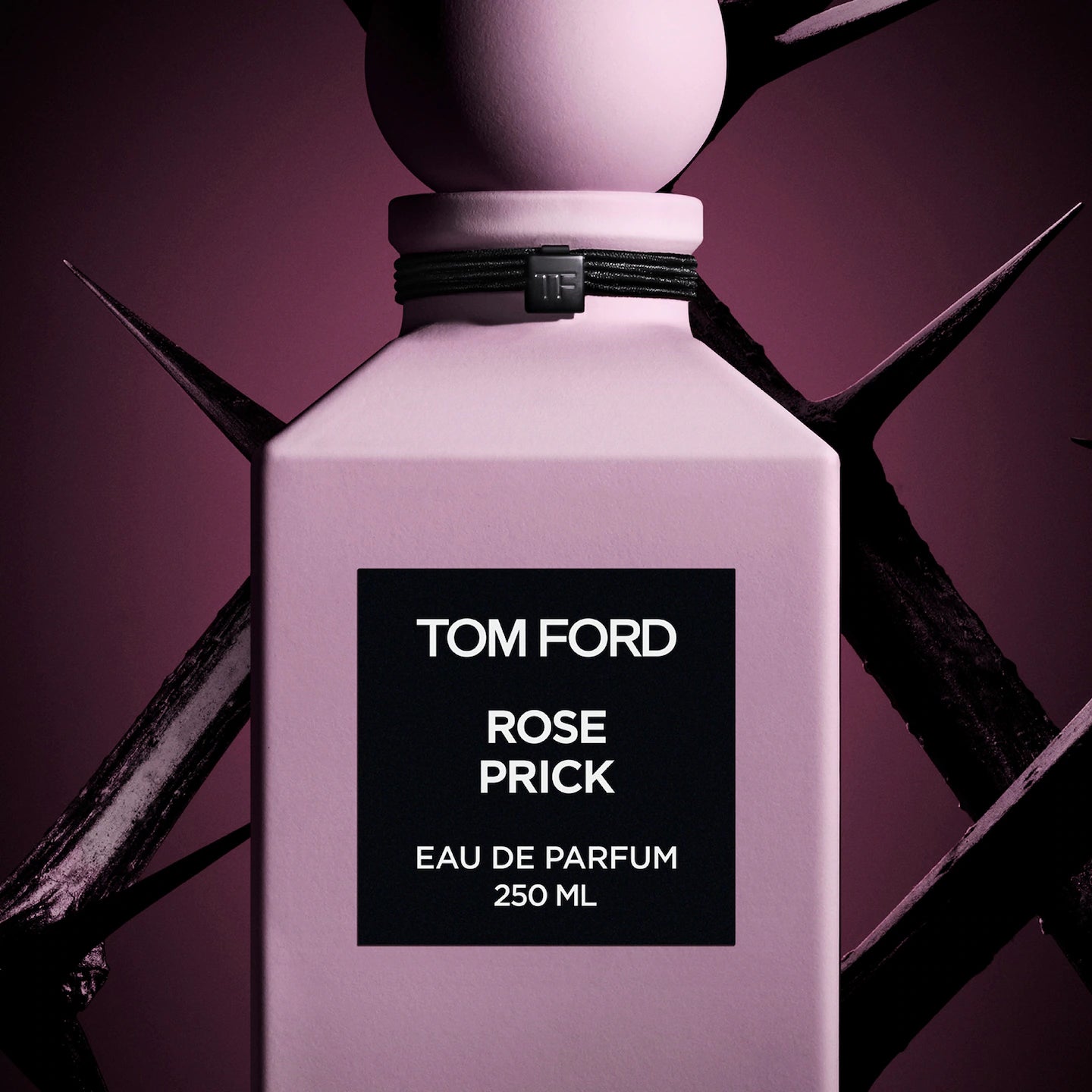 perfume pink and black bottle