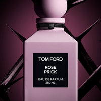 perfume pink and black bottle